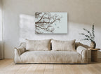 Swallows Among Bare Branches landscape canvas print on the wall of a living room