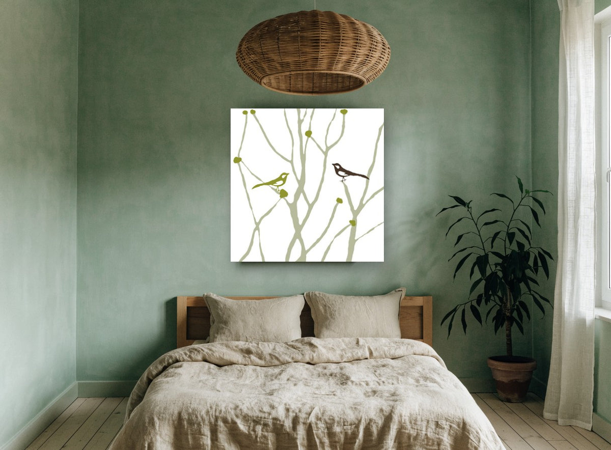 Two Birds Among Branches floral canvas print on the wall of a bedroom