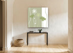 Sage Lace Silhouettes floral canvas print on the wall of a hallway