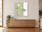 Sage Lace Silhouettes floral canvas print on the wall of a living room above a sideboard