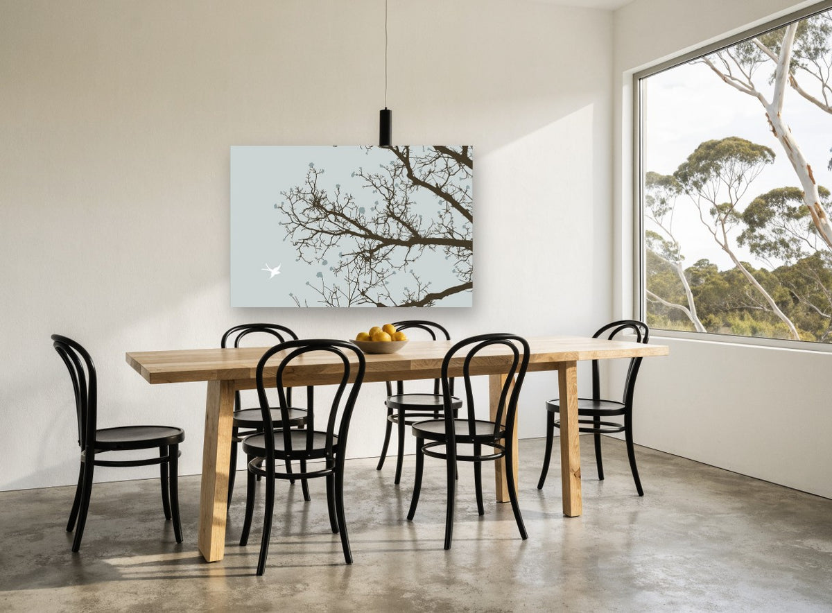 Bird Among Bare Branches landscape canvas print on the wall of a dining room