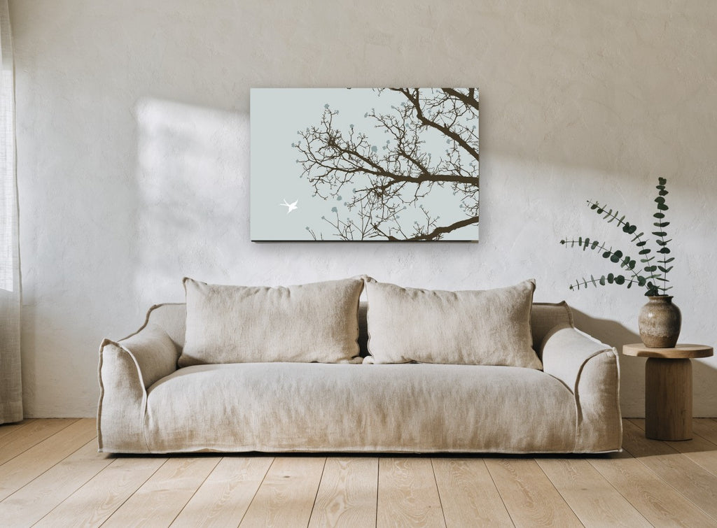 Bird Among Bare Branches landscape canvas print on the wall of a living room