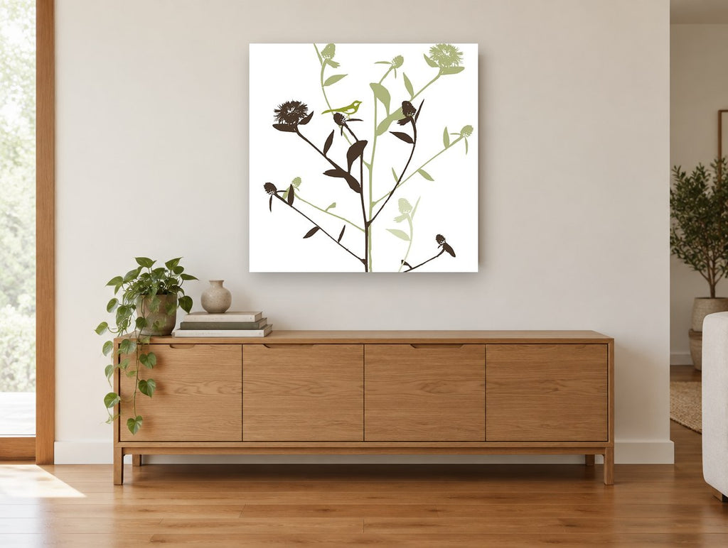 Songbird Among Thistles floral canvas print on the wall of a living room above a sideboard