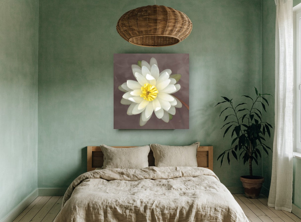 White Lily Bloom floral canvas print on the wall of a bedroom