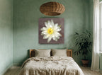 White Lily Bloom floral canvas print on the wall of a bedroom