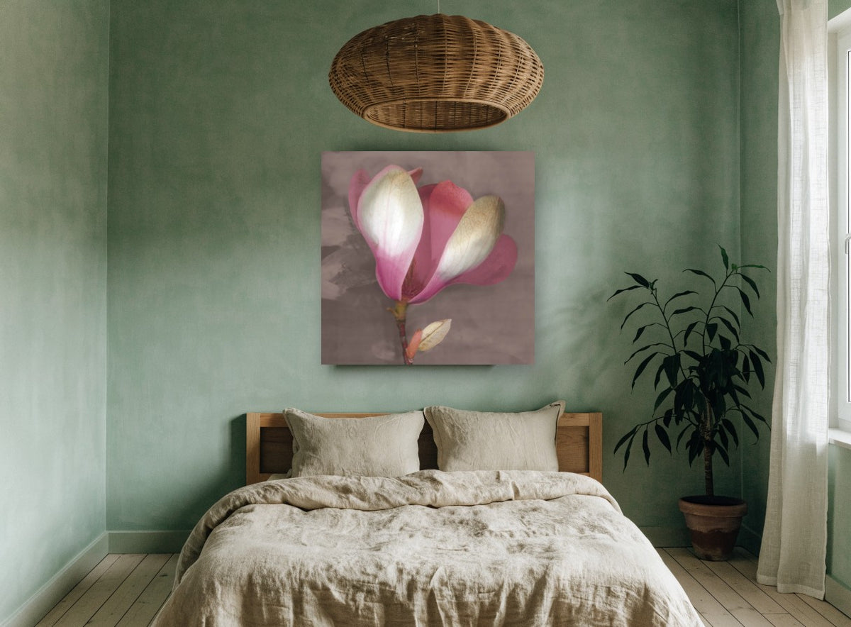 Blushing Magnolia Bloom floral canvas print on the wall of a bedroom