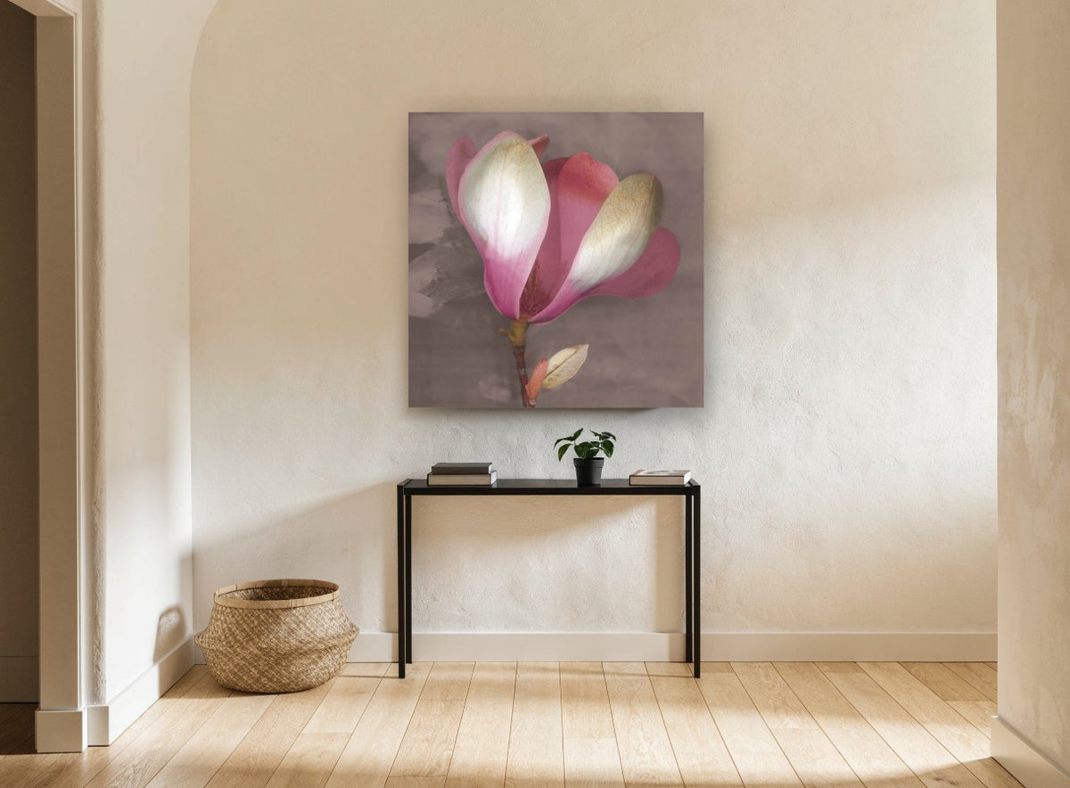 Blushing Magnolia Bloom floral canvas print on the wall of a hallway
