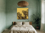 Ochre Branch Silhouettes landscape canvas print on the wall of a bedroom