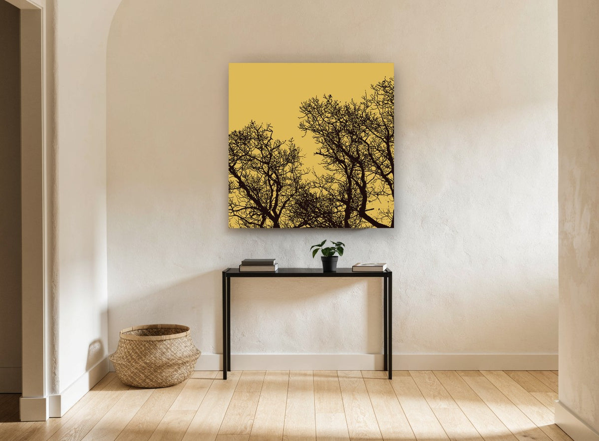 Ochre Branch Silhouettes landscape canvas print on the wall of a hallway