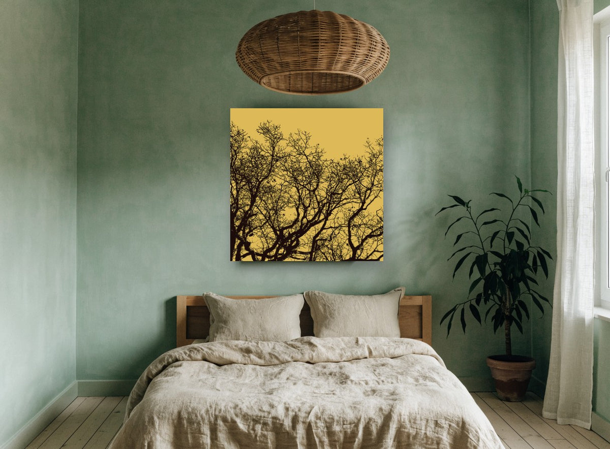 Golden Branch Silhouette landscape canvas print on the wall of a bedroom