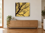 Ochre Branch Silhouette landscape canvas print on the wall of a living room above a sideboard