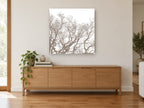 Bare Branch Canopy landscape canvas print on the wall of a living room above a sideboard