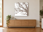 Taupe Oak Branch Tracery landscape canvas print on the wall of a living room above a sideboard