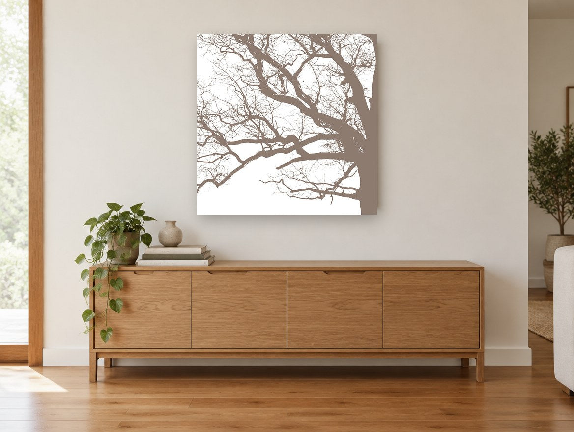 Bare Oak Silhouette landscape canvas print on the wall of a living room above a sideboard
