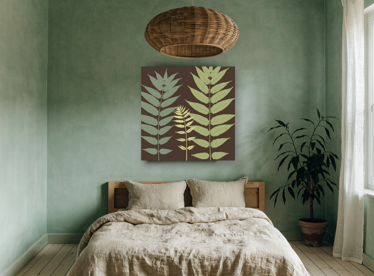 Three Fronds on Chocolate floral canvas print on the wall of a bedroom