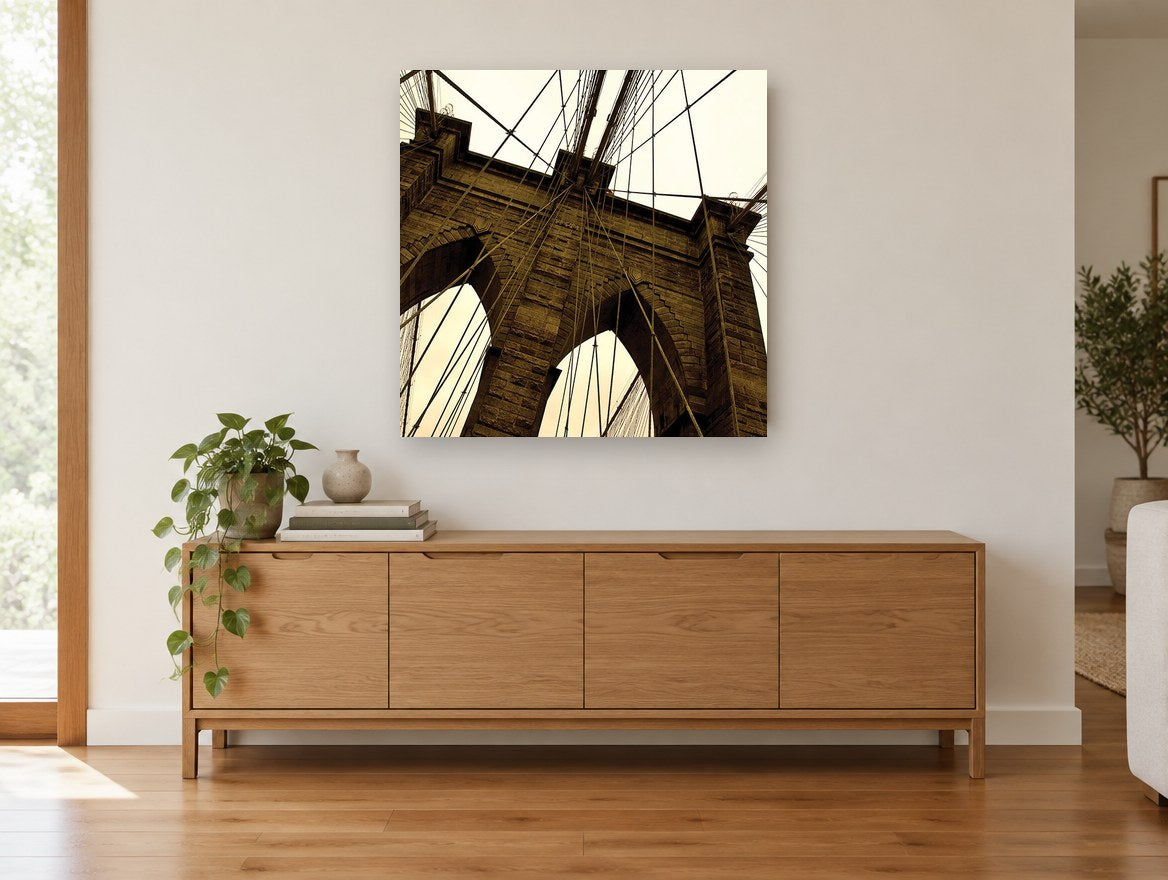 Brooklyn Bridge Sepia Tower city canvas print on the wall of a living room above a sideboard