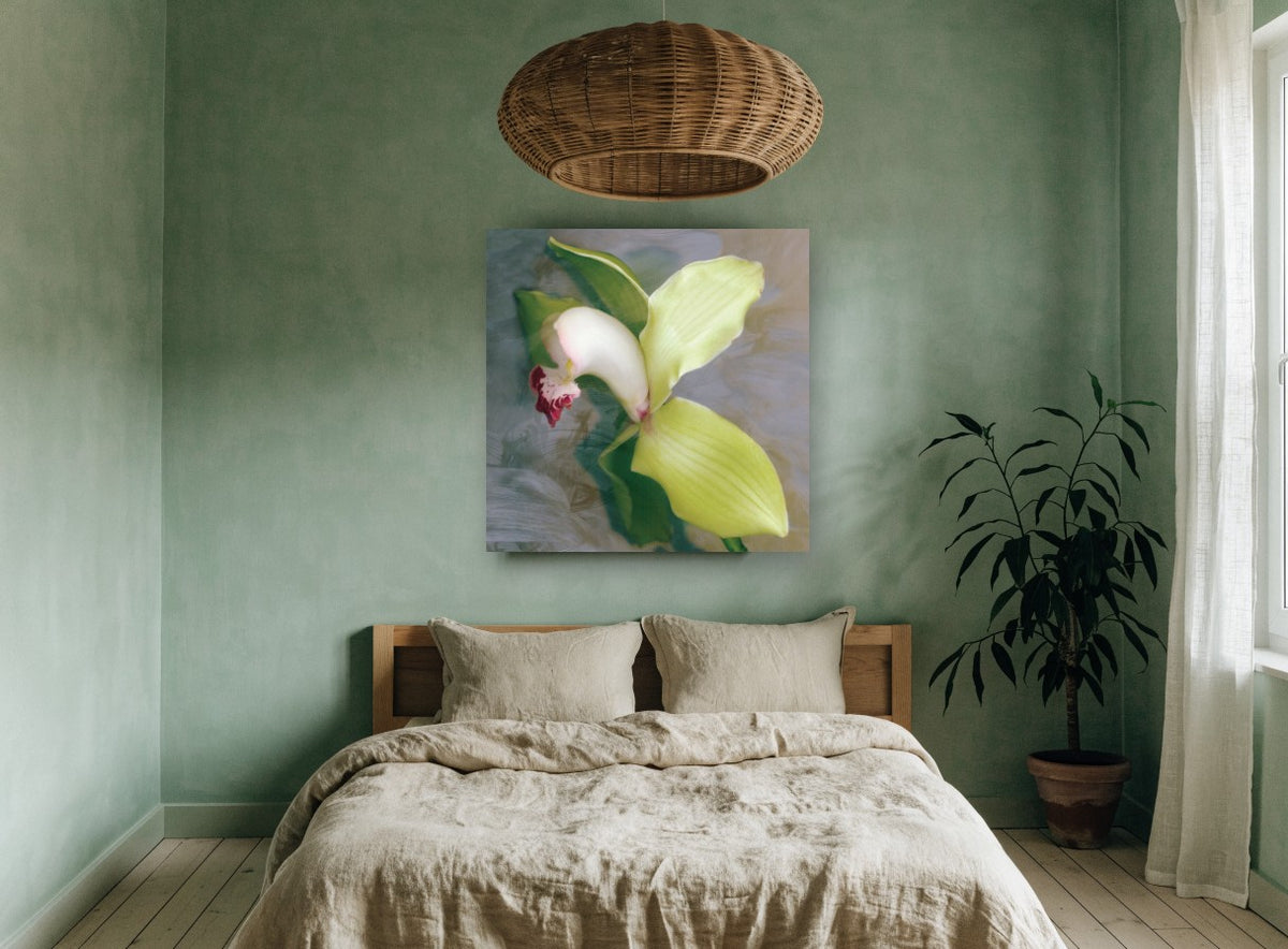 Green Cymbidium Orchid floral canvas print on the wall of a bedroom