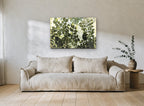 Green Leaflets in Light floral canvas print on the wall of a living room