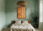 Rust Branches Over Stripes floral canvas print on the wall of a bedroom