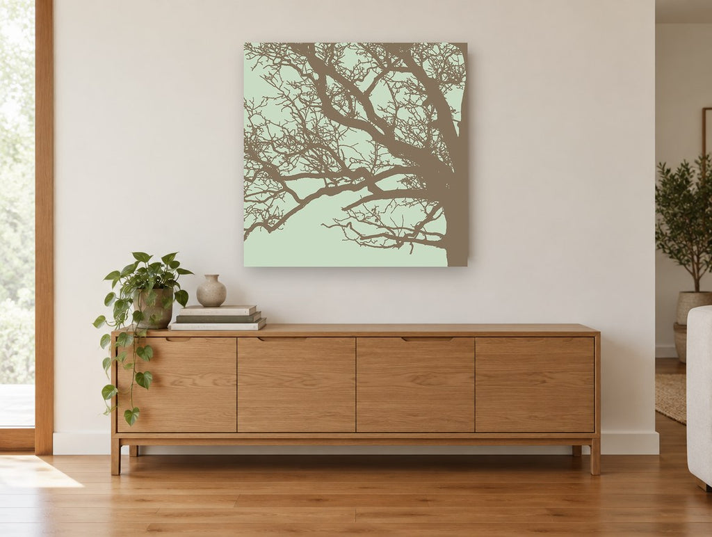 Bare Branch Silhouette landscape canvas print on the wall of a living room above a sideboard