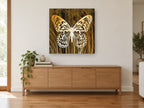 Amber Grain Butterfly floral canvas print on the wall of a living room above a sideboard