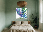 Prismatic Palm Fronds floral canvas print on the wall of a bedroom