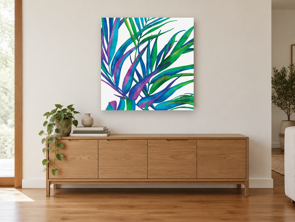 Jewel Palm Fronds floral canvas print on the wall of a living room above a sideboard