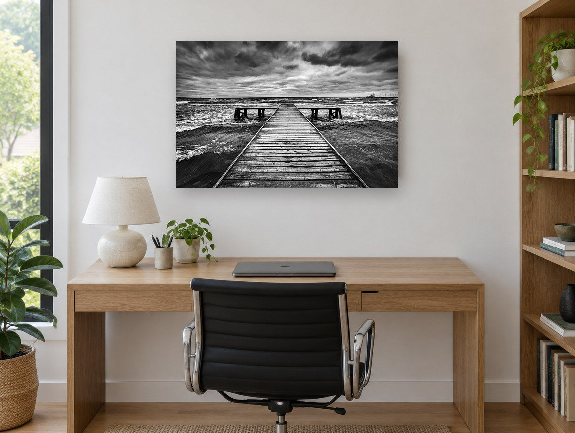 Monochrome Tempest Jetty coastal canvas print on the wall of a study