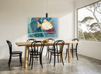 Cream Fish Among Reeds coastal canvas print on the wall of a dining room