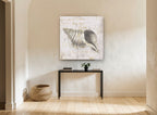 Gilded Whelk Shell vintage canvas print on the wall of a hallway