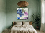 Blue Blooms in Ice floral canvas print on the wall of a bedroom