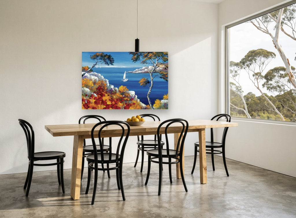 Poppy Cliff Sailing Bay coastal canvas print on the wall of a dining room