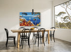 Poppy Cliff Sailing Bay coastal canvas print on the wall of a dining room