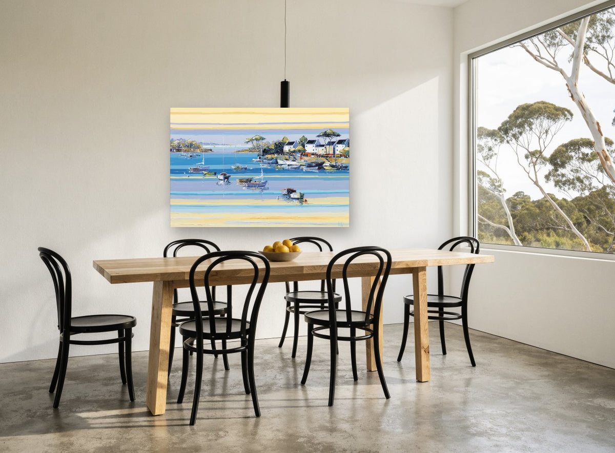 Sunlit Mooring Bay coastal canvas print on the wall of a dining room