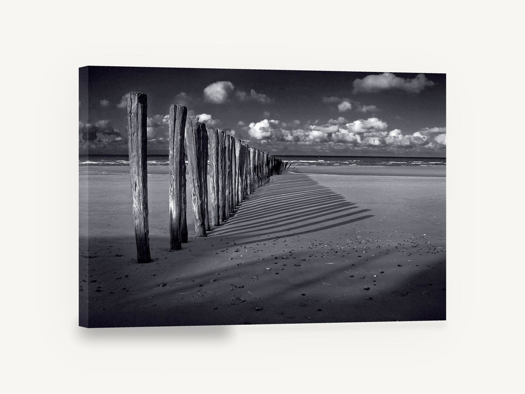 Groyne Shadows at Low Tide, beach groyne posts black and white, coastal canvas wall art print ready to hang