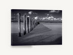 Groyne Shadows at Low Tide, beach groyne posts black and white, coastal canvas wall art print ready to hang