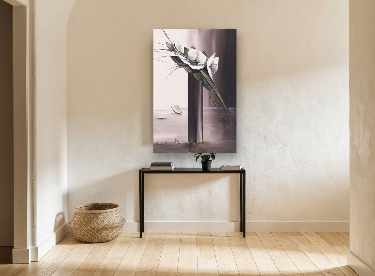 White Blooms Tall Vase floral canvas print on the wall of a hallway