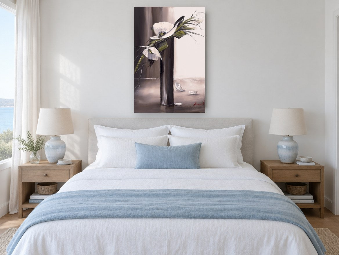 White Blooms in Dark Vase floral canvas print on the wall of a coastal bedroom