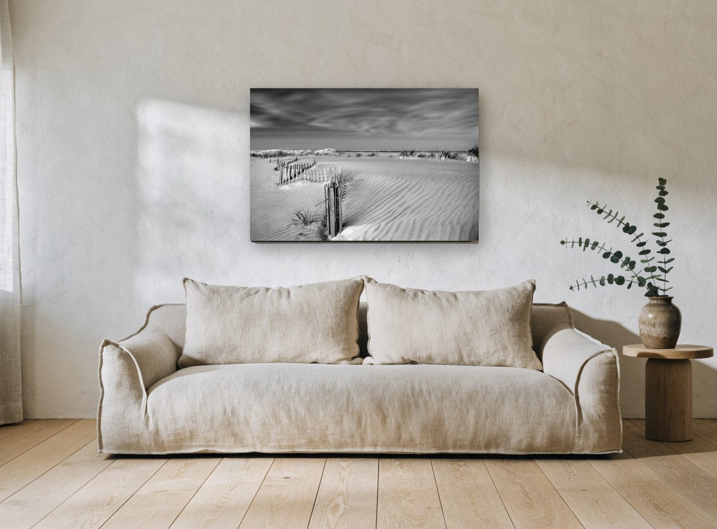 Dune Fence Drift coastal canvas print on the wall of a living room