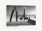 Silent Pilings at Dusk, weathered pilings black and white seascape, coastal canvas wall art print ready to hang
