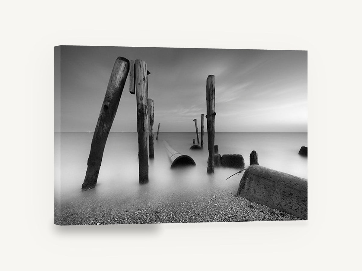 Silent Pilings at Dusk, weathered pilings black and white seascape, coastal canvas wall art print ready to hang