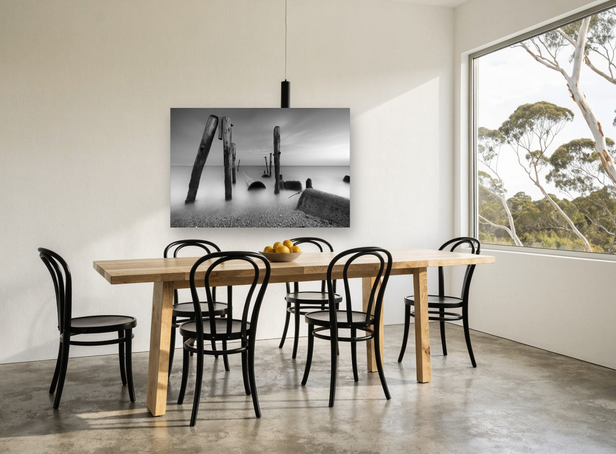 Silent Pilings at Dusk coastal canvas print on the wall of a dining room