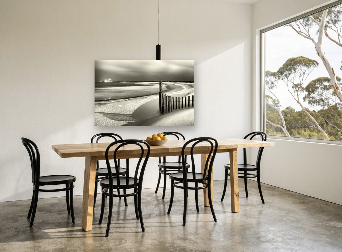 Moonlit Dune Fence coastal canvas print on the wall of a dining room