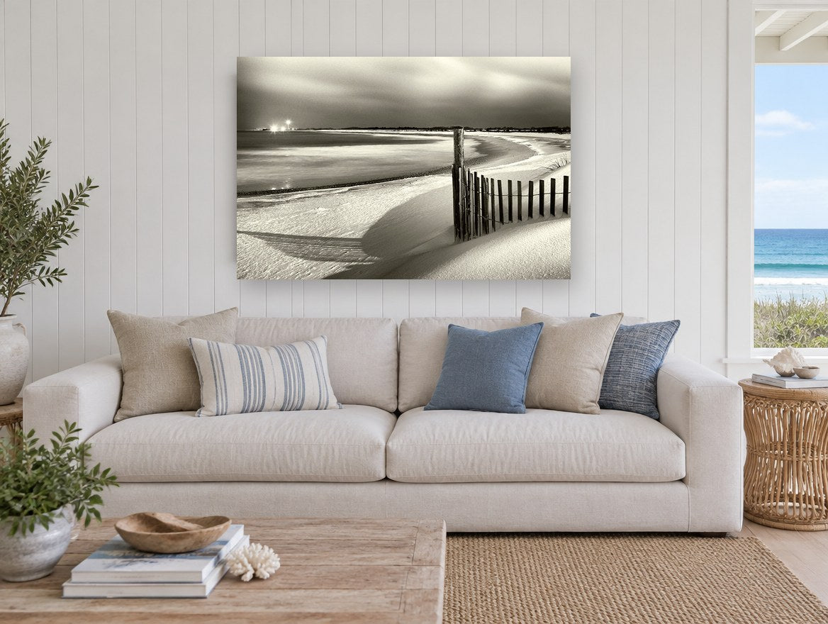 Moonlit Dune Fence coastal canvas print on the wall of a beach house living room