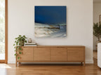 Snowbound Dune Fence coastal canvas print on the wall of a living room above a sideboard