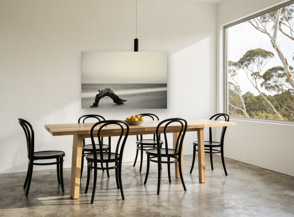 Driftwood Arch at Dusk coastal canvas print on the wall of a dining room