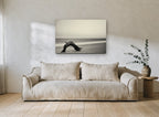 Driftwood Arch at Dusk coastal canvas print on the wall of a living room