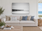 Pier in the Mist coastal canvas print on the wall of a beach house living room