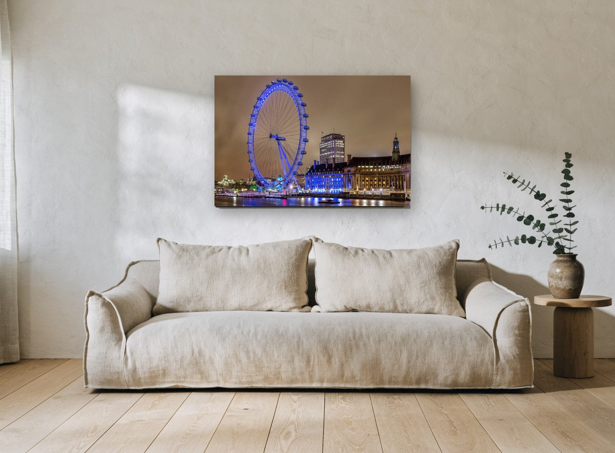 Blue Wheel on the Thames city canvas print on the wall of a living room