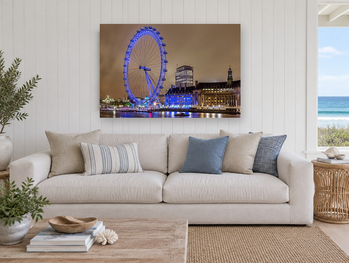 Blue Wheel on the Thames city canvas print on the wall of a beach house living room